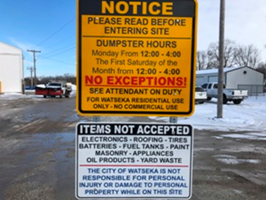 sign stating all the dumpster rules